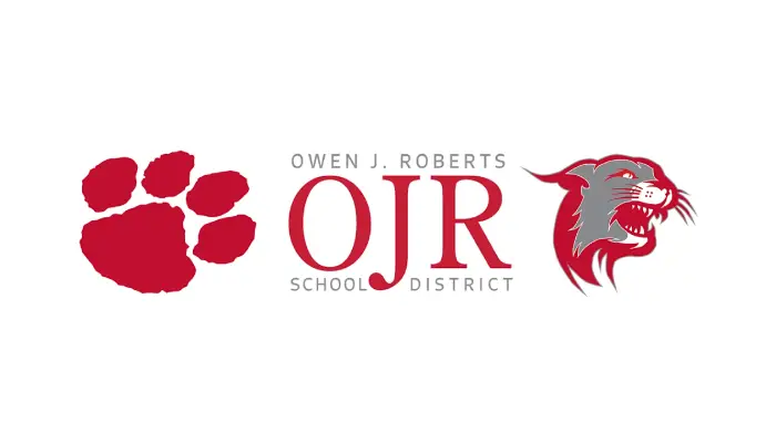Owen J. Roberts School District logo with a red paw print on the left, bold 'OJR' initials in the center, and a stylized tiger head on the right.