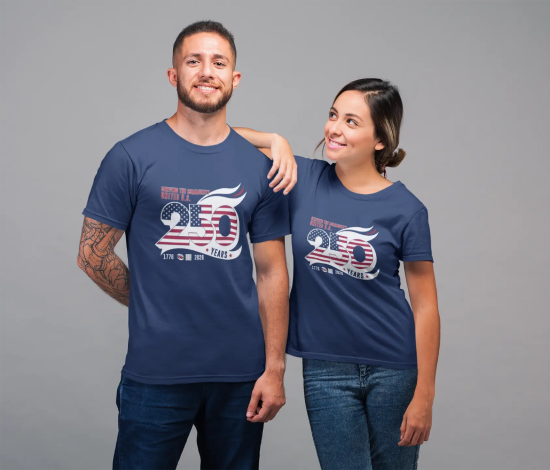 Two people in navy 250-year anniversary T-shirts stand side by side, the woman resting her arm on the man's shoulder.
